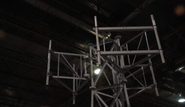 Cell tower pictured at night.