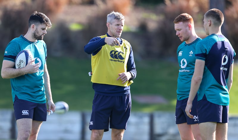 Harry Byrne, Ciarán Frawley and Sam Prendergast with Ireland defence coach Simon Easterby during an Ireland training camp in January 2024. Photograph: Dan Sheridan/Inpho