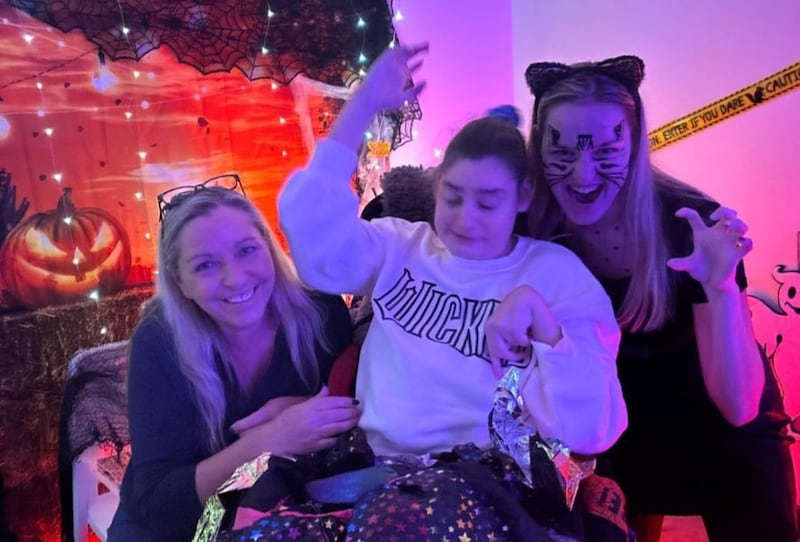 Tracey and Kayla pictured with Ellie (middle), who has quadriplegic cerebral palsy and is a full-time wheelchair user PICTURE: TRACEY HENRY