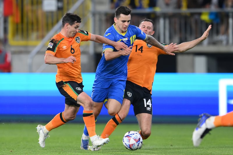 Ireland's Josh Cullen (right) and Alan Browne close in on Ukraine's Mykola Shaparenko in a UEFA Nations League game in Lodz, Poland, in 2022. Photograph: Adam Nurkiewicz/Getty Images
