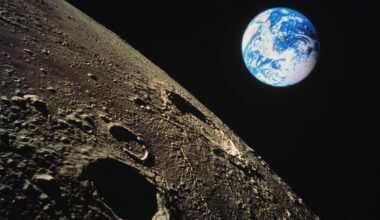 view of Earth with moon surface in foreground