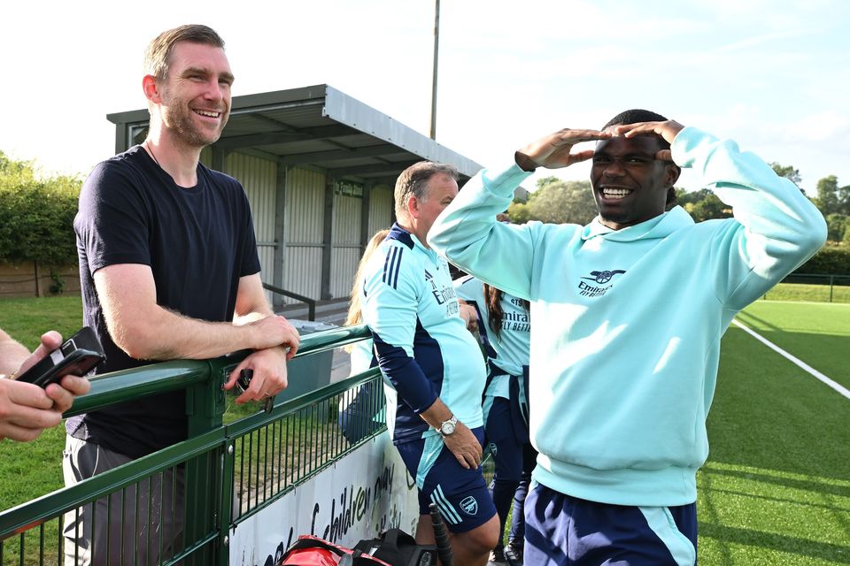 Arsenal Academy Director Per Mertesacker with Jakai Fisher before a pre-season friendly match between Hendon and Arsenal U18 at Silver Jubilee Park. (Photo by David Price/Arsenal FC via Getty Images)