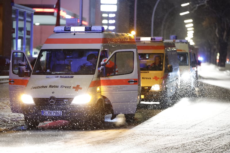 Vehicles of Emergency workers stand on a street in Zehlendorf during a power outage in southern districts of Berlin. Photograph: Getty Images