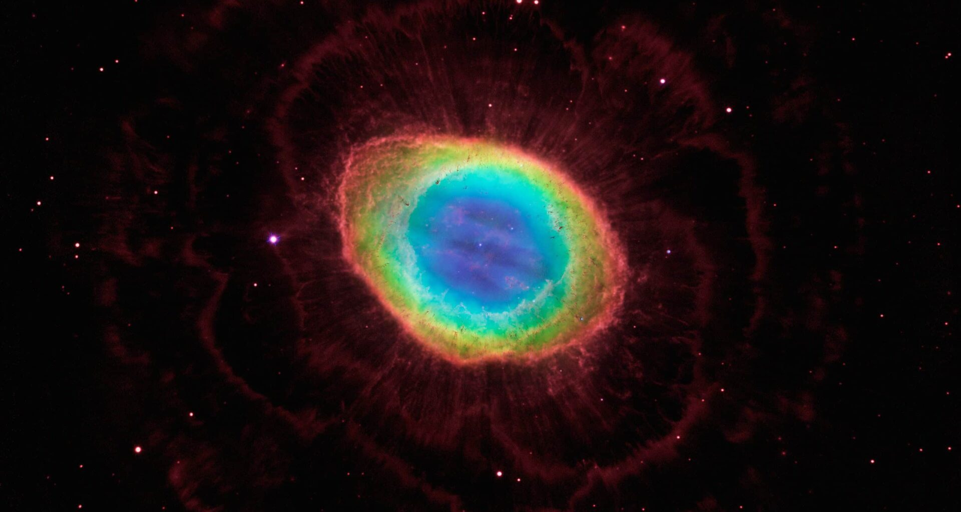 Vivid colorful nebula in space with bright stars, showcasing celestial beauty and deep universe mysteries.