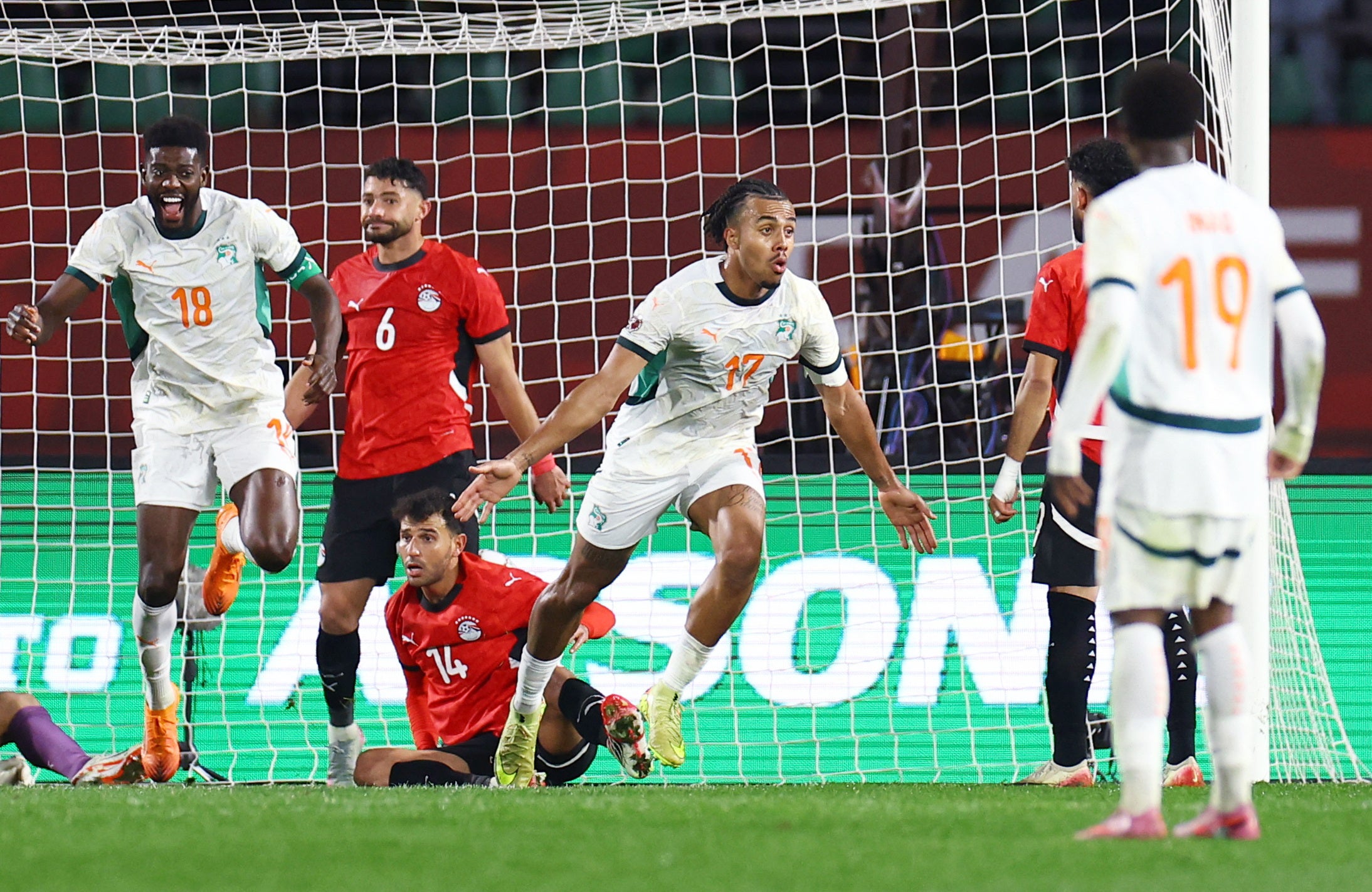 Ivory Coast's Guela Doue celebrates scoring