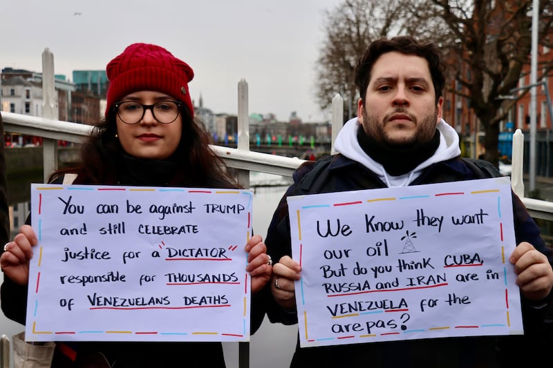 Oraini Ribas and her husband Gustavo Lanz Nunez protest in Dublin
