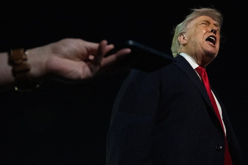 US president Donald Trump speaks with reporters before boarding Air Force One at Palm Beach International Airport in Florida on Monday. Photograph: Andrew Caballero-Reynolds/AFP via Getty Images