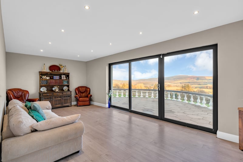 Formal living room enjoys dramatic views