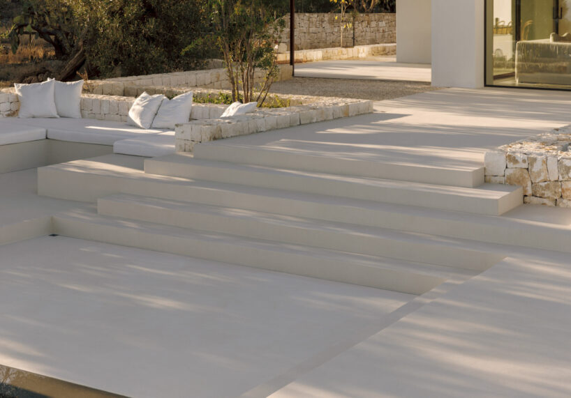 tela architettura revives abandoned concrete shell into italian countryside refuge