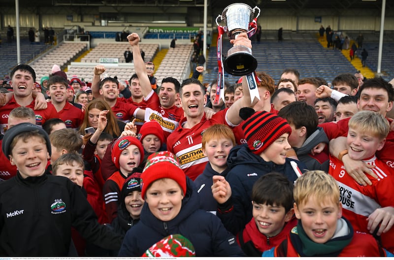 Dingle captain Paul Geaney and teammates celebrate with the cup after the AIB Munster GAA Football Senior Club Championship final match between Dingle and St Finbarr's at FBD Semple Stadium in Thurles, Tipperary