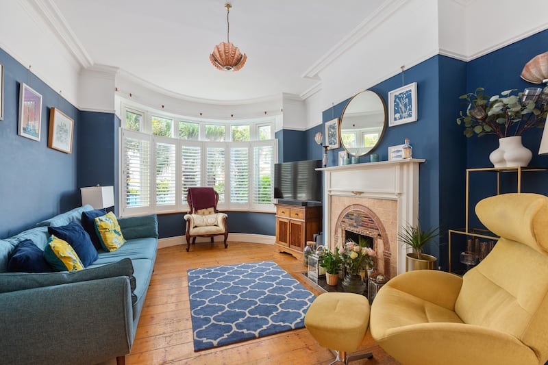 Livingroom, with feature fireplace and hardwood flooring