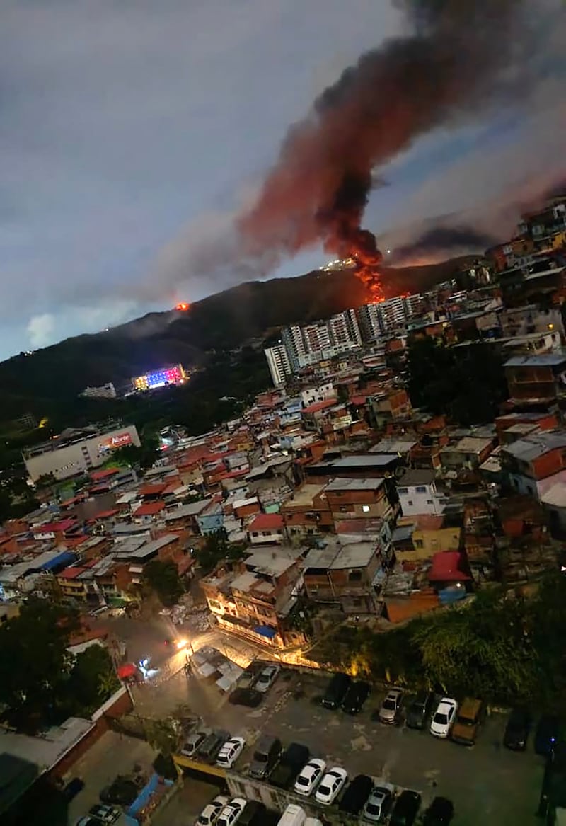 Fire is seen at Fuerte Tiuna, Venezuela's largest military complex, after a series of explosions in Caracas on Saturday. Photograph: AFP via Getty Images