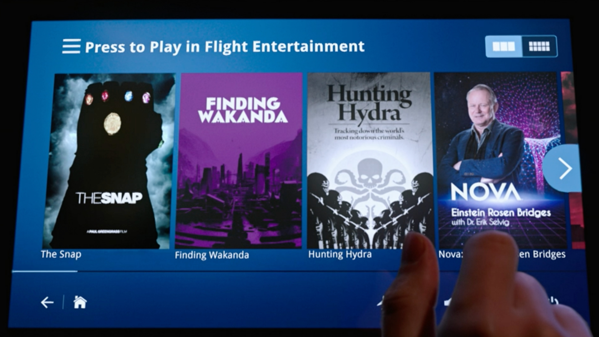 A screenshot from "Spider-Man: Far from Home" showing a tablet with several fictional shows on a streaming service, including a documentary called "Nova: Einstein-Rosen Bridges with Dr Erik Selvig".