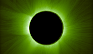 Artificial solar eclipses: A black disk thickly surrounded by green wispy lines streaming outward against a black background.