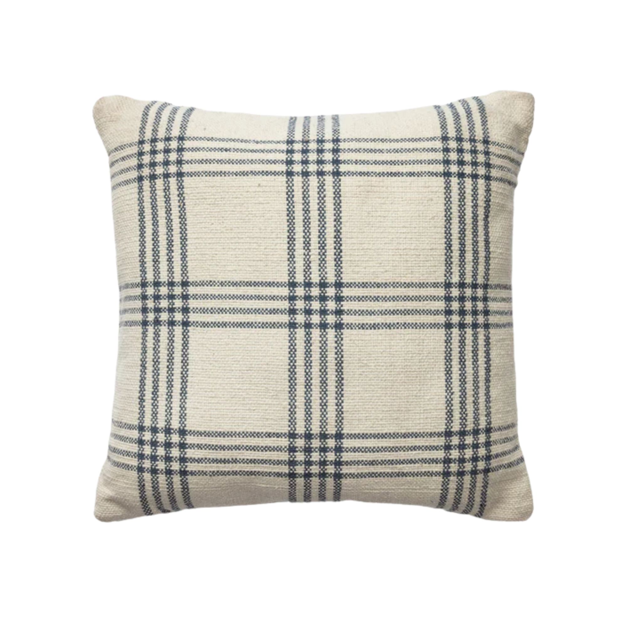 a blue and white checkered pillow