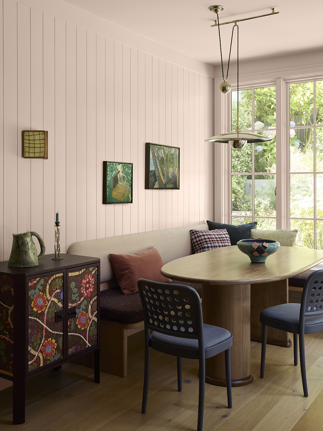 pink dining room with modern furnishings