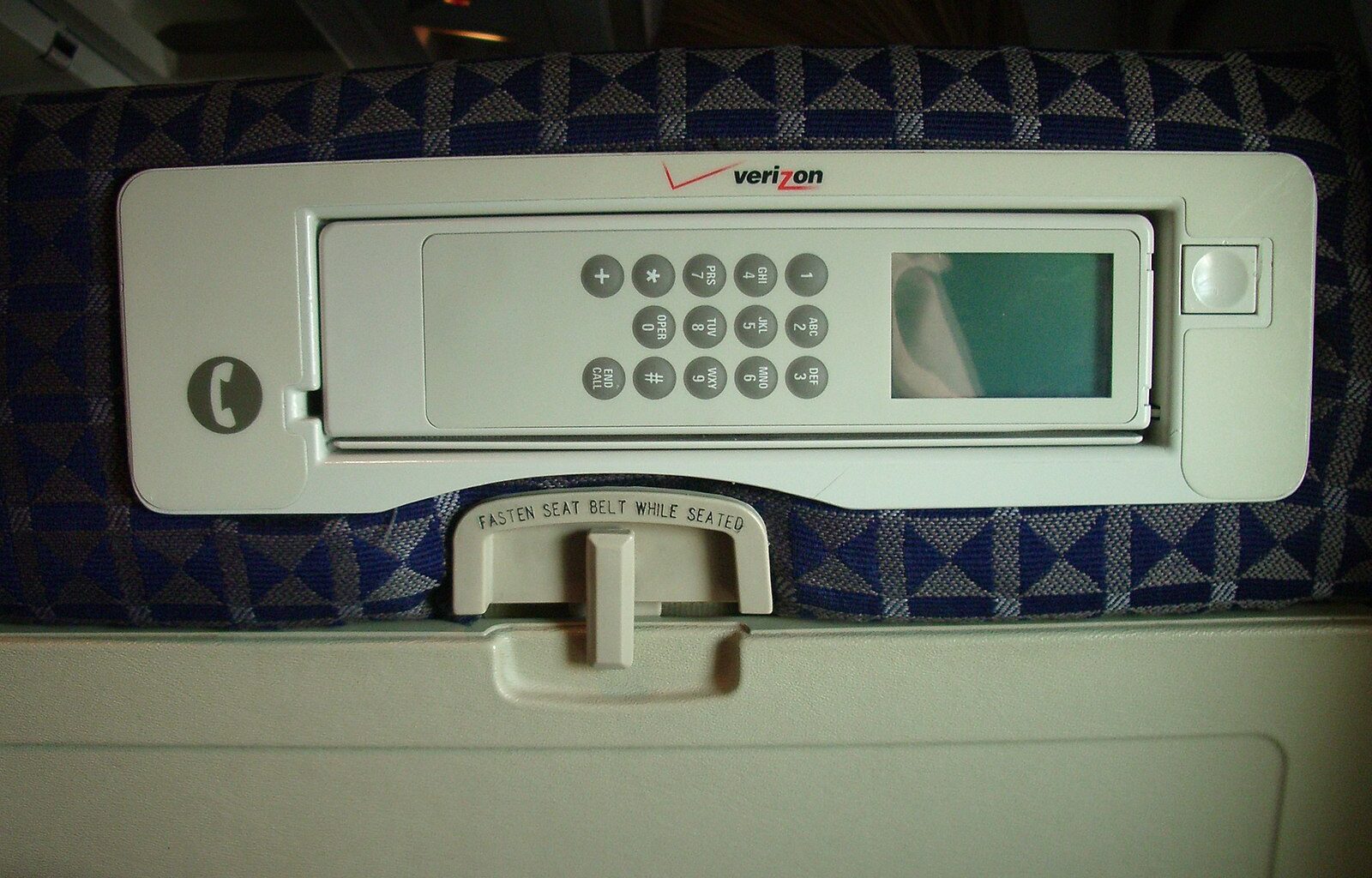 Airfone in the back of an aircraft seat