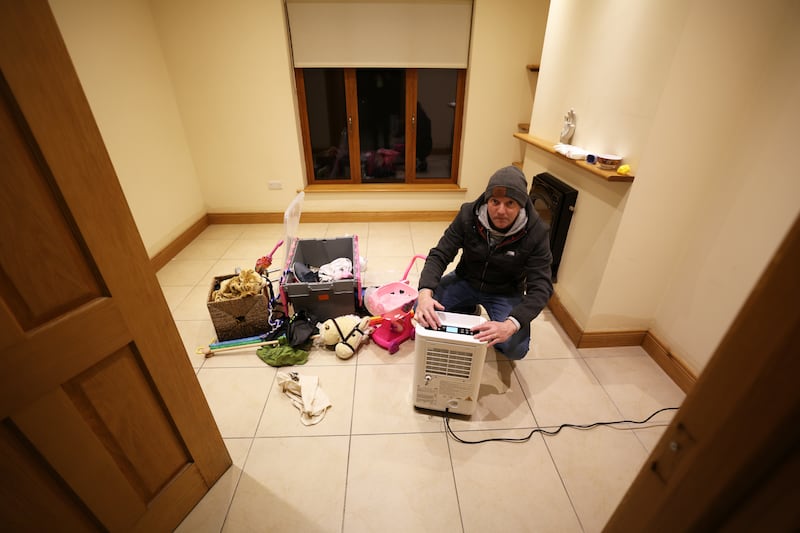 Johan Keating at his flooded home in Kilternan, Co. Dublin, where he's keeping dehumidifiers running. Photographs: Nick Bradshaw
