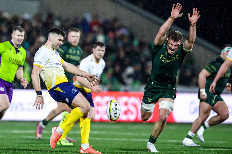 Cian Prendergast attempts to charge down Harry Byrne’s kick. Photograph: Nick Elliott/Inpho