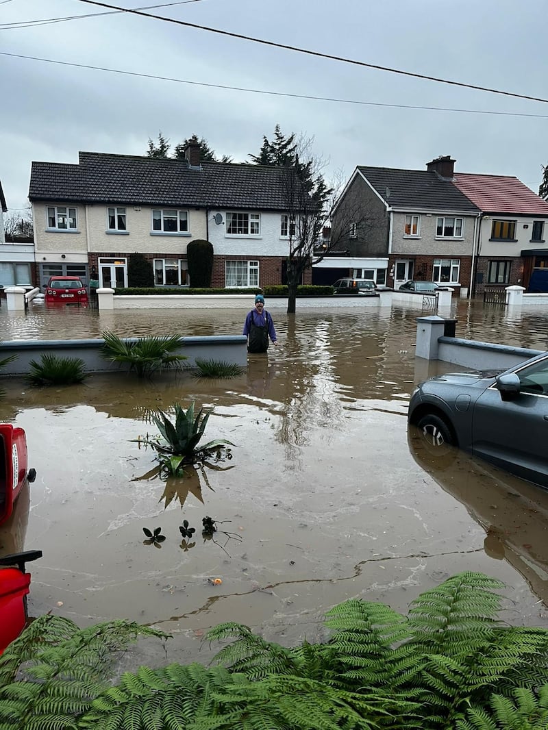 Ciaran Kirwan stands outside his house in Grange Park