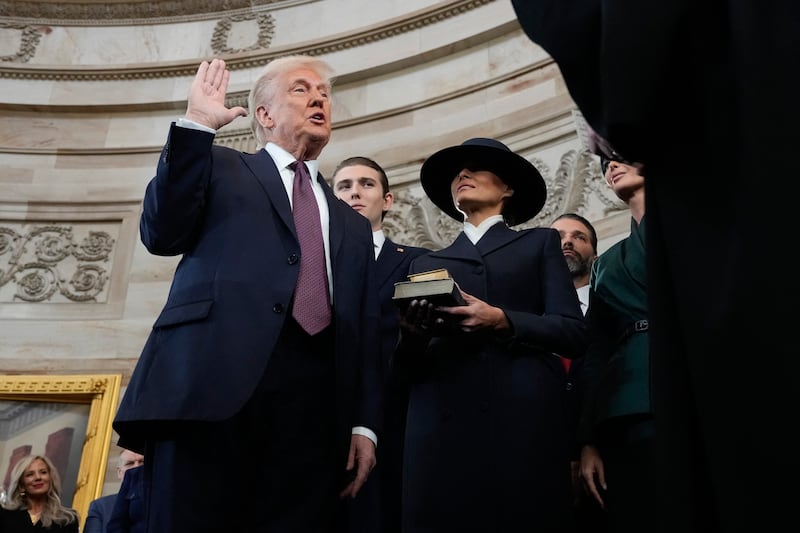 Donald Trump is sworn in as the 47th president of the United States as Melania Trump holds the Bible at the US Capitol in Washington, on January 20th, 2025. Photograph: MORRY GASH/POOL/AFP via Getty Images