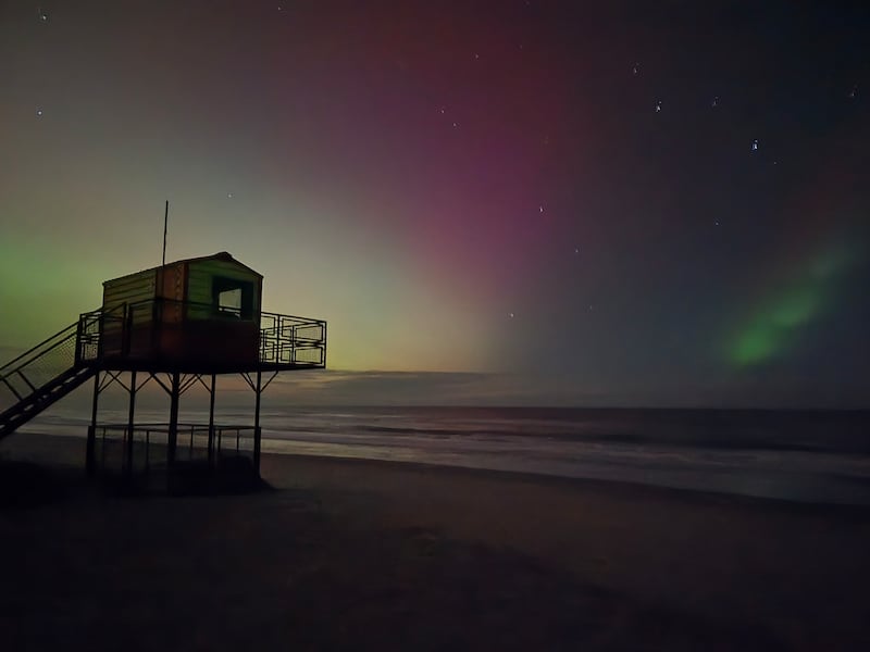 The Northern Lights shining over the waves of Brittas Bay on Monday night. Photograph: Colm Hennessy