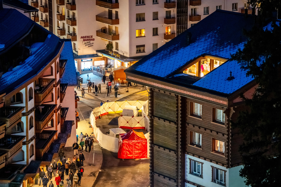 A large cordon and multiple forensic tents in place outside Le Constellation in Crans-Montana
