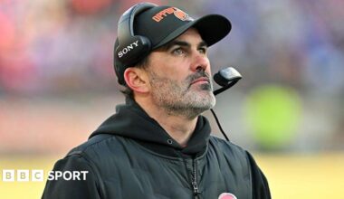 Luke Littler celebrates winning the 2026 PDC World Championship as tickertape falls