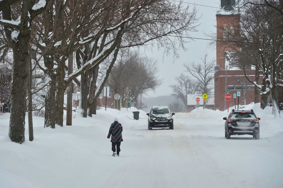 Snow blankets Church Street in St. Joseph, Mich., on Monday, Jan. 26, 2026, after a winter storm dumped several inches of snow. (Don Campbell/The Herald-Palladium via AP)