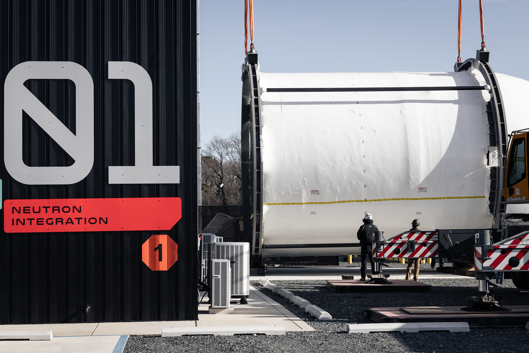 A rocket fairing is being transported