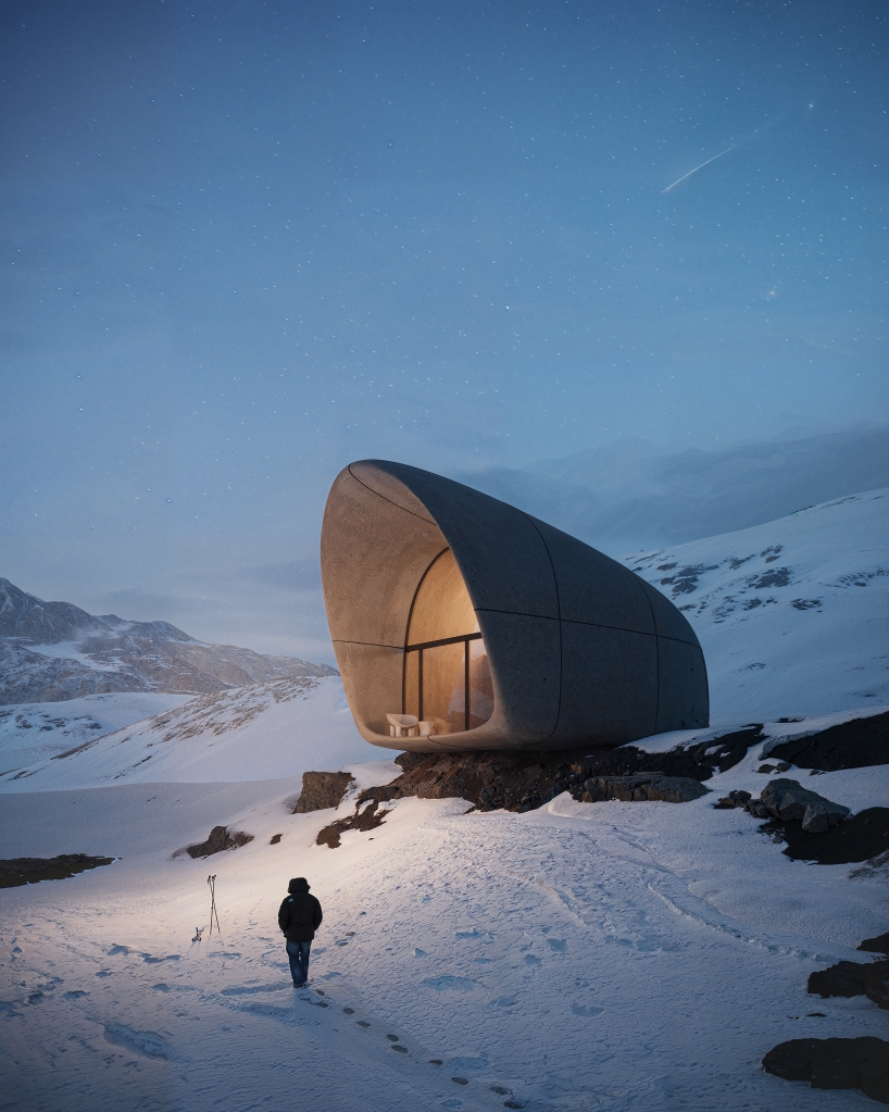 high-altitude cottage emerges like a rock from georgian mountains
