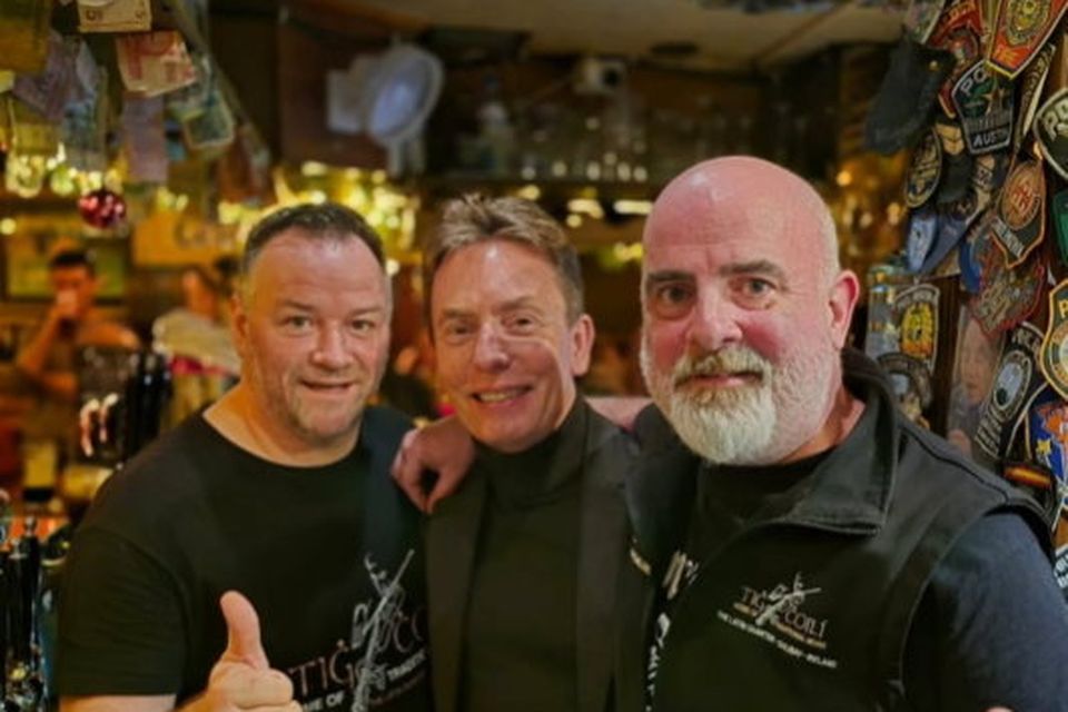 Former world snooker champion Ken Doherty poses with staff at Tig Cóilí in Galway city. Photo: @tigchoili/Instagram