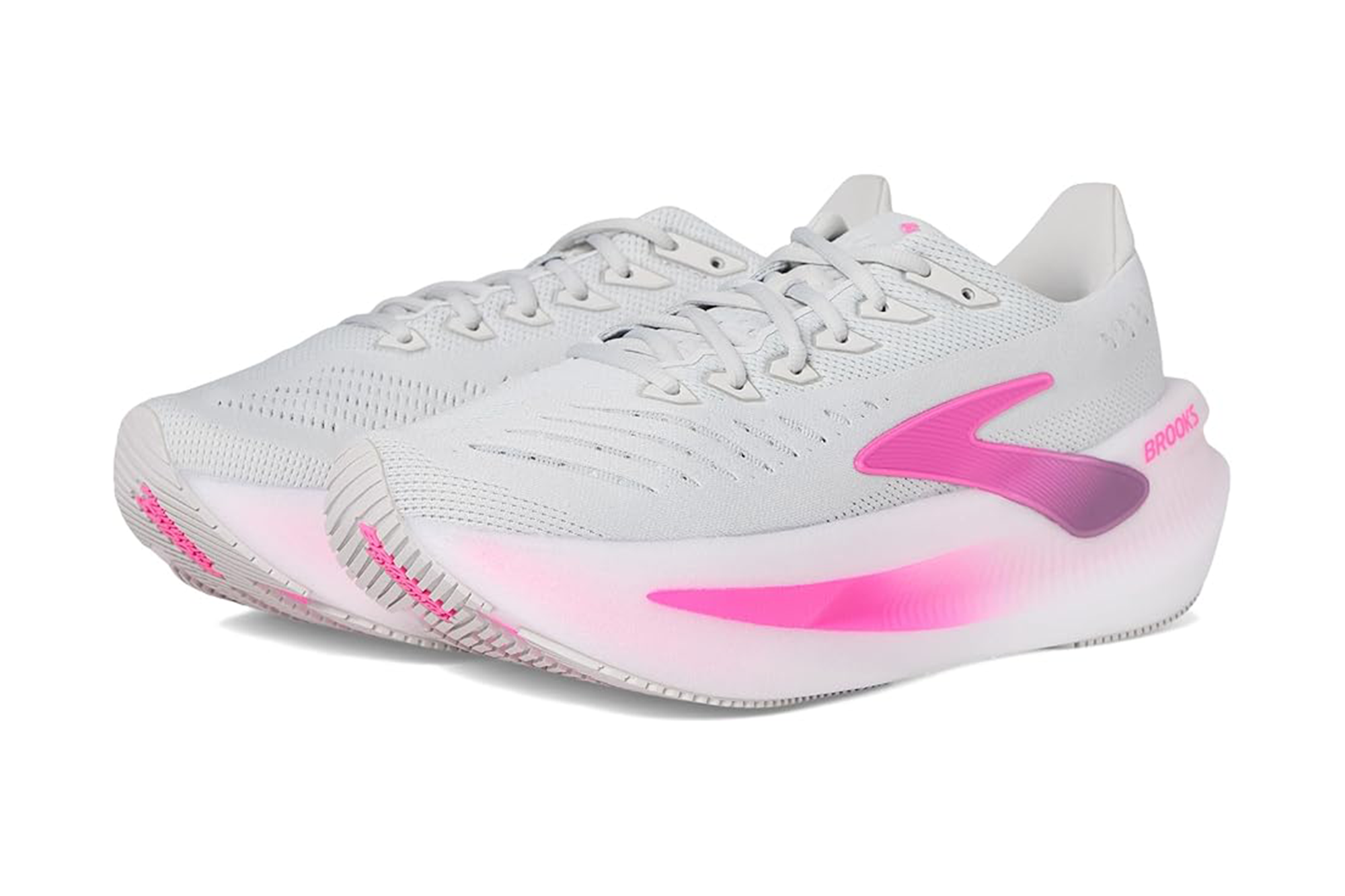 Pair of white Brooks running shoes with pink accents.