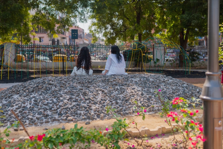 reclaimed materials sculpt textured children’s play structures in india public park