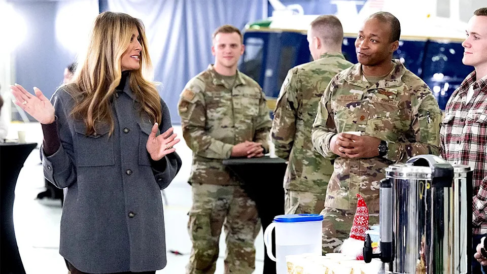 First Lady Melania Trump speaks with U.S. service members after assembling care packages during an American Red Cross holiday event at Joint Base Andrews.