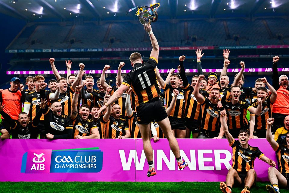 Kilbrittain captain Philip Wall celebrates with the cup in front of his teammates and staff after victory in the All-Ireland Junior Hurling Club Championship final against Easkey at Croke Park in Dublin. Photo: Piaras Ó Mídheach/Sportsfile