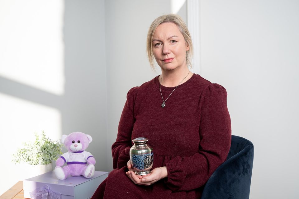 Nurse Niamh Murphy from Cork with the ashes of her son Odhrán and his teddy bear. Photo: John Allen/Provision