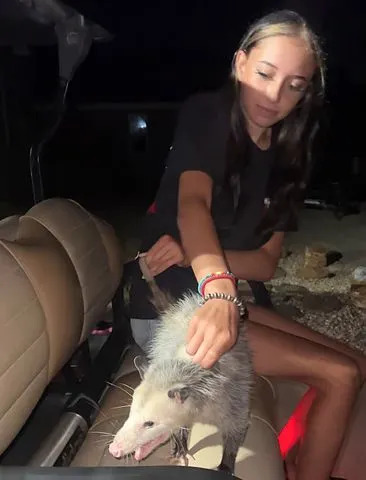 Brittanii Lehman Talia Lehman and the opossum