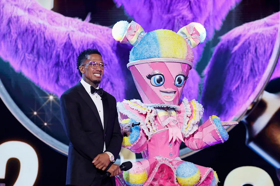 Nick Cannon and Snow Cone on the special two-hour Season 14 premiere of "The Masked Singer," airing Wednesday, Jan. 7, 2026.