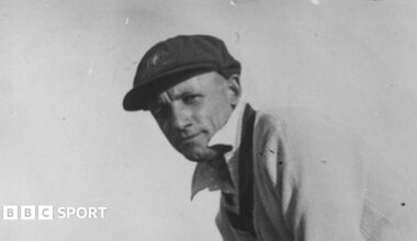 Don Bradman wearing a baggy green cap