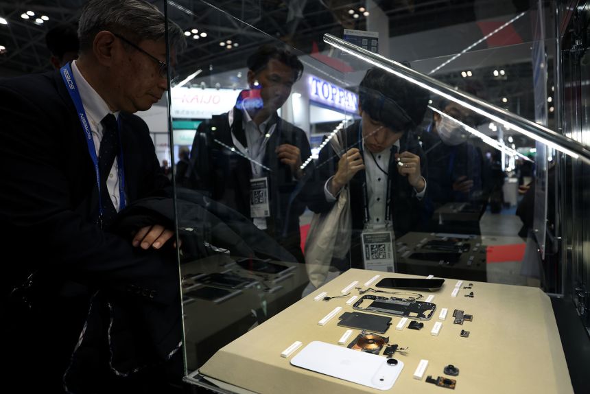 Components of an iPhone Air are displayed in Tokyo, Japan, on December 18, 2025.