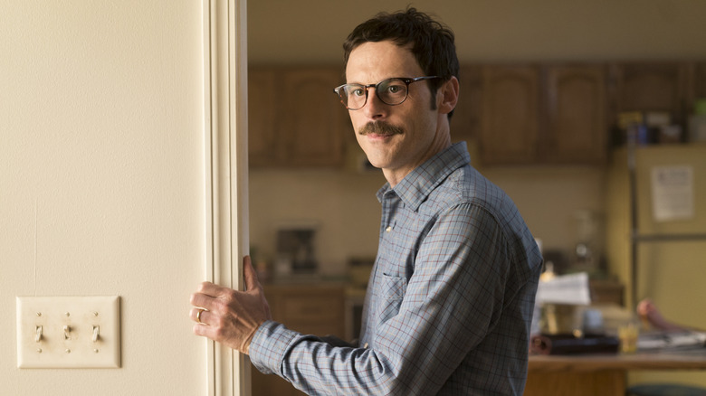 Scoot McNairy's Gordon Clark leaning on a doorframe on Halt and Catch Fire