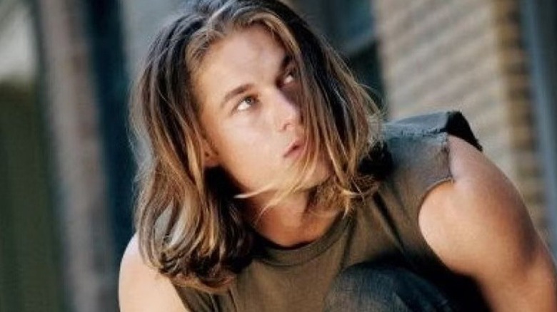 Tarzan (Travis Fimmel) wearing a vest on Tarzan