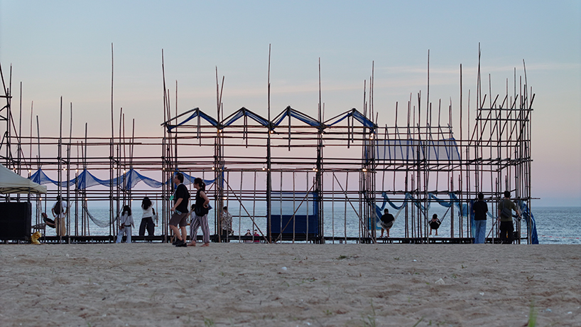 traditional bamboo scaffolding constructs temporary theater along chinese coast