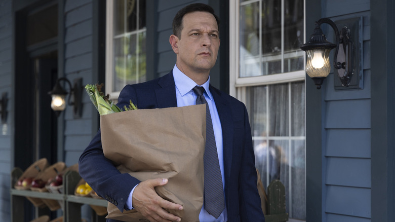 Josh Charles as Martin holds a grocery bag in Best Medicine