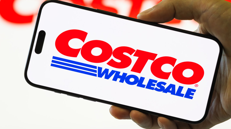 A smartphone displaying the Costco logo.