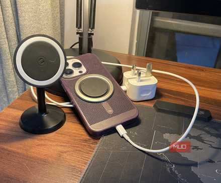 iPhone with a charger and wireless charger