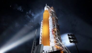 An illustration of NASA's Space Launch System (SLS) rocket lit up at night in its Block 1 crew vehicle configuration.