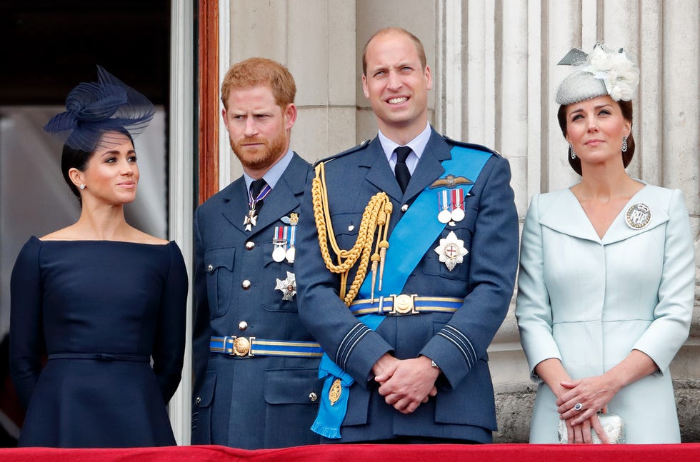 meghan, duchess of sussex, prince harry, duke of sussex, prince william, duke of cambridge and catherine, duchess of cambridge watch a flypast to mark the centenary of the royal air force from the balcony of buckingham palace on july 10, 2018 in london