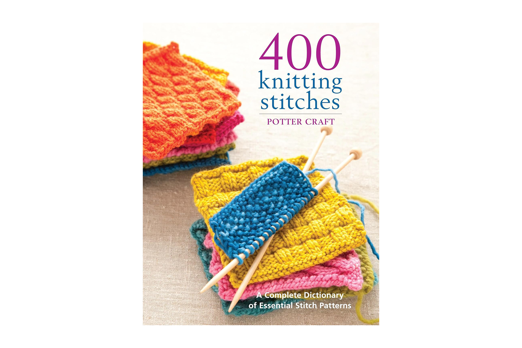 Cover of the book "400 knitting stitches" showing colorful knitted swatches and knitting needles.
